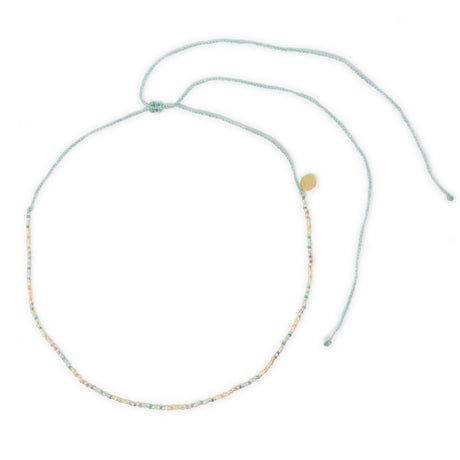 pastel colored rainbow beaded waterproof choker necklace top view shown on white