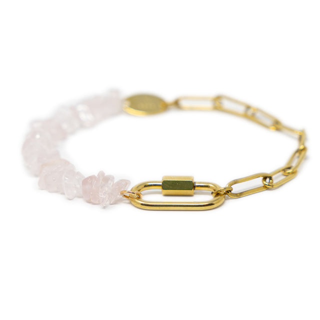 Gold chain bracelet with rose quartz beads and a god carabiner for charms on a white background
