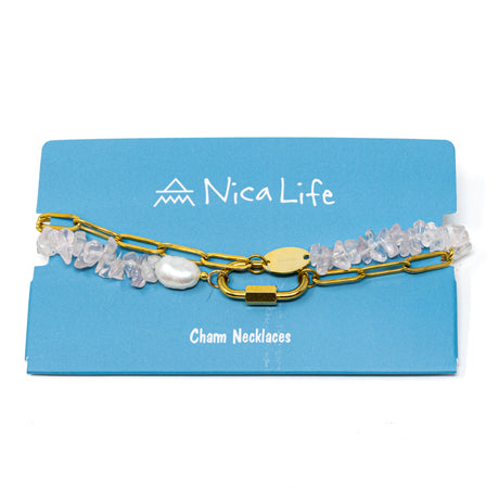 Charm necklace with rose quartz stones and gold chain on a blue card with 'Nica Life' branding