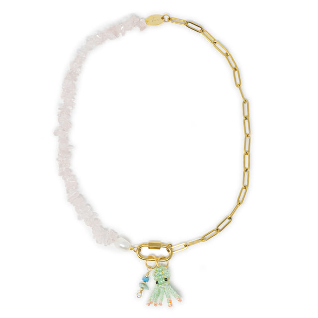 Rose quartz and pearl charm necklace with octopus and stone charms on gold carabiner clasp shown on white