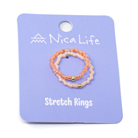 Set of pink beaded stretch rings on a  purple Nica Life branded card