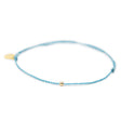 Teal thread anklet with one gold filled bead on white front view