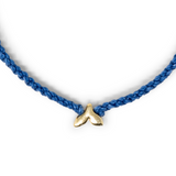 Whale Tail Charm Close Up on White
