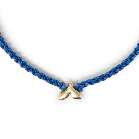 Whale Tail Charm Close Up on White
