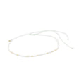 White & gold waterproof choker necklace for surfer girls on white background, adjustable with waterproof cord