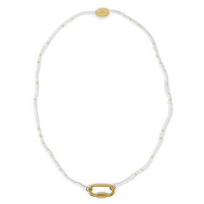 Seed bead charm bar necklace in white and gold shown on white top view