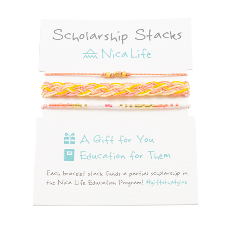 Three pink, yellow, coral and gold bracelets shown on a Nica Life branded product card